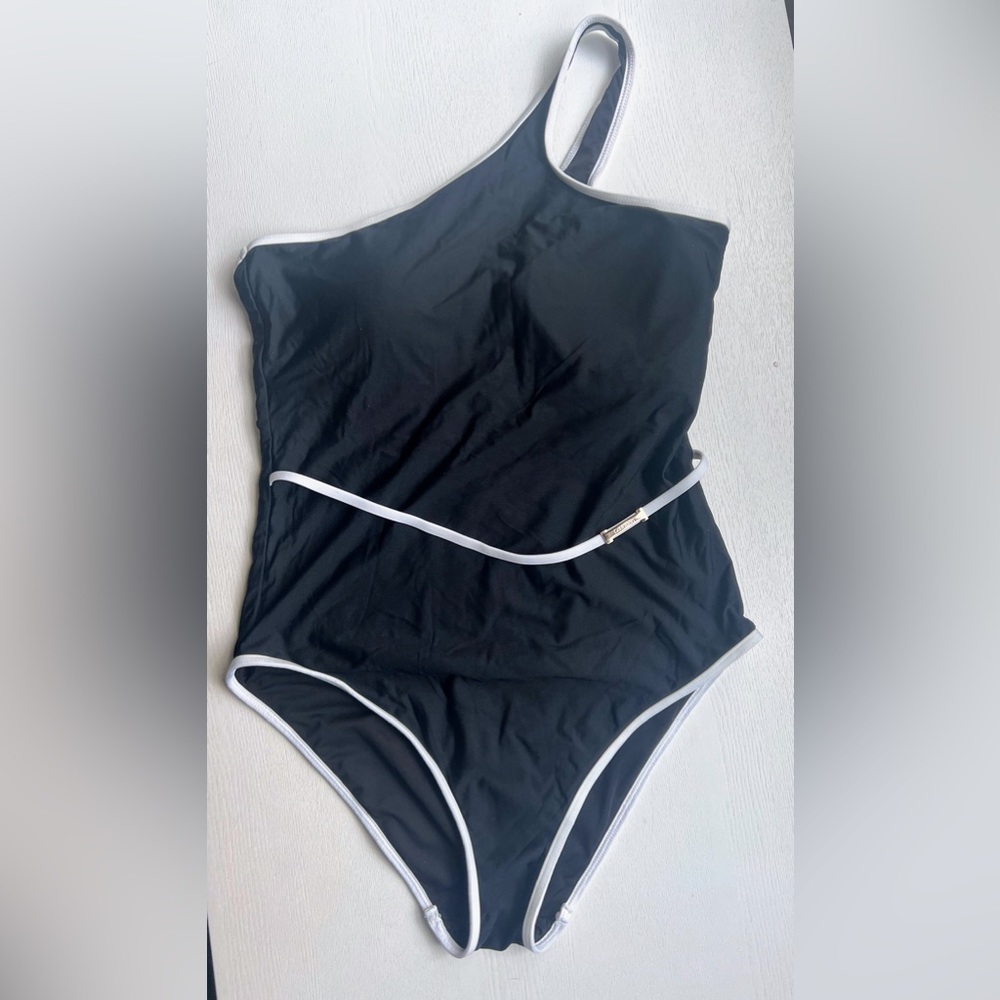 Calvin Klein one piece bathing suit in black and white. Size 8. Medium.